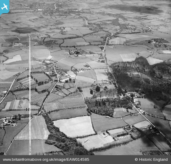 EAW014585 ENGLAND (1948). Sandpit Wood and the village, Magham Down